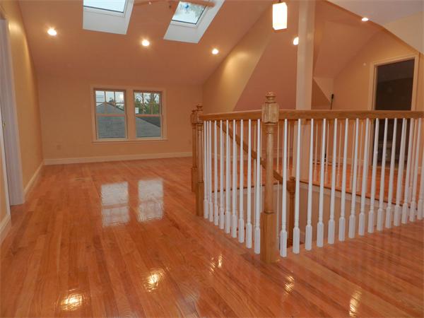 21 Glenland Road, Unit 2 Chestnut Hill, MA 02467 - Photo 27 of 30 a view of entryway with wooden floor