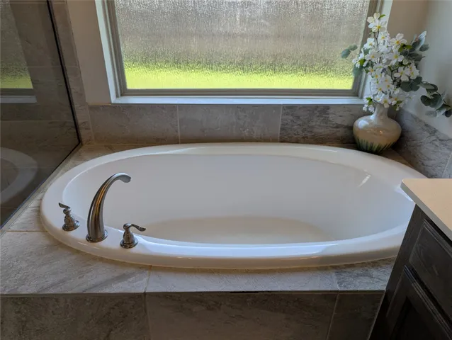 a kitchen with a sink stove and microwave