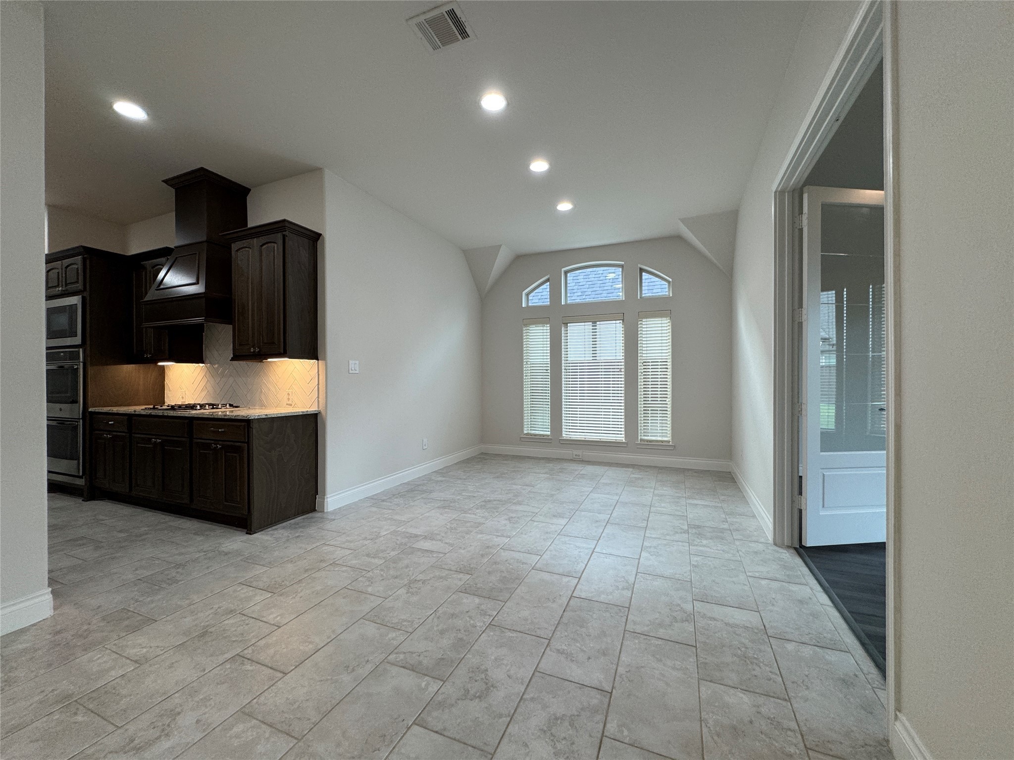 10323 Granite Court Rosharon, TX 77583 - Photo 21 of 44 a view of a room with table and chairs