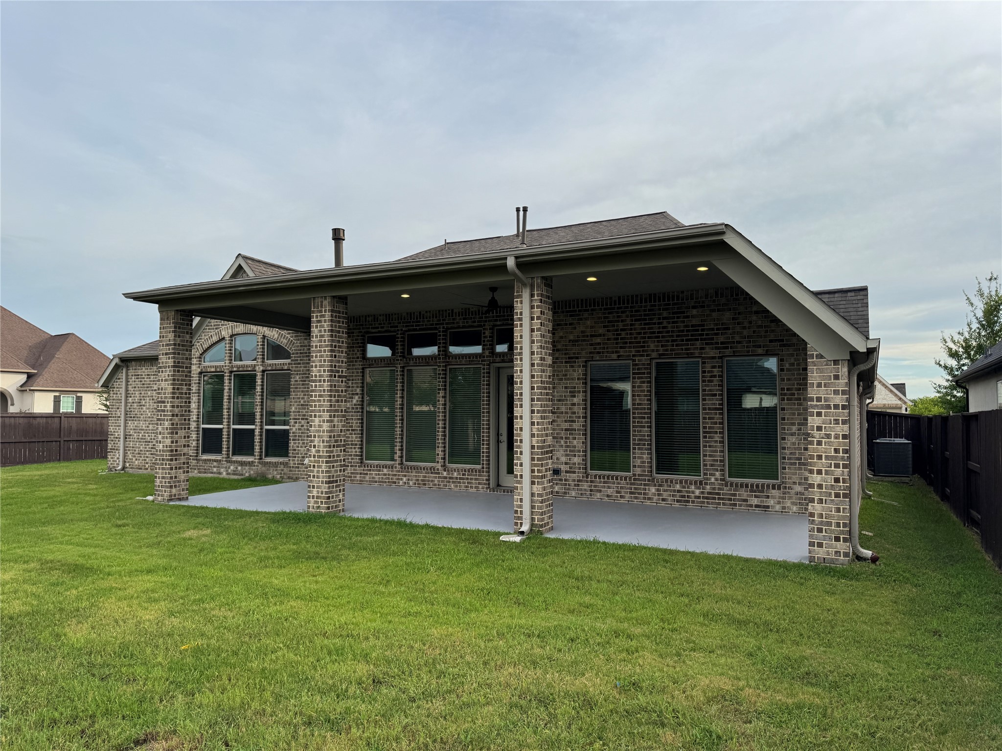 10323 Granite Court Rosharon, TX 77583 - Photo 33 of 44 a view of house with a yard