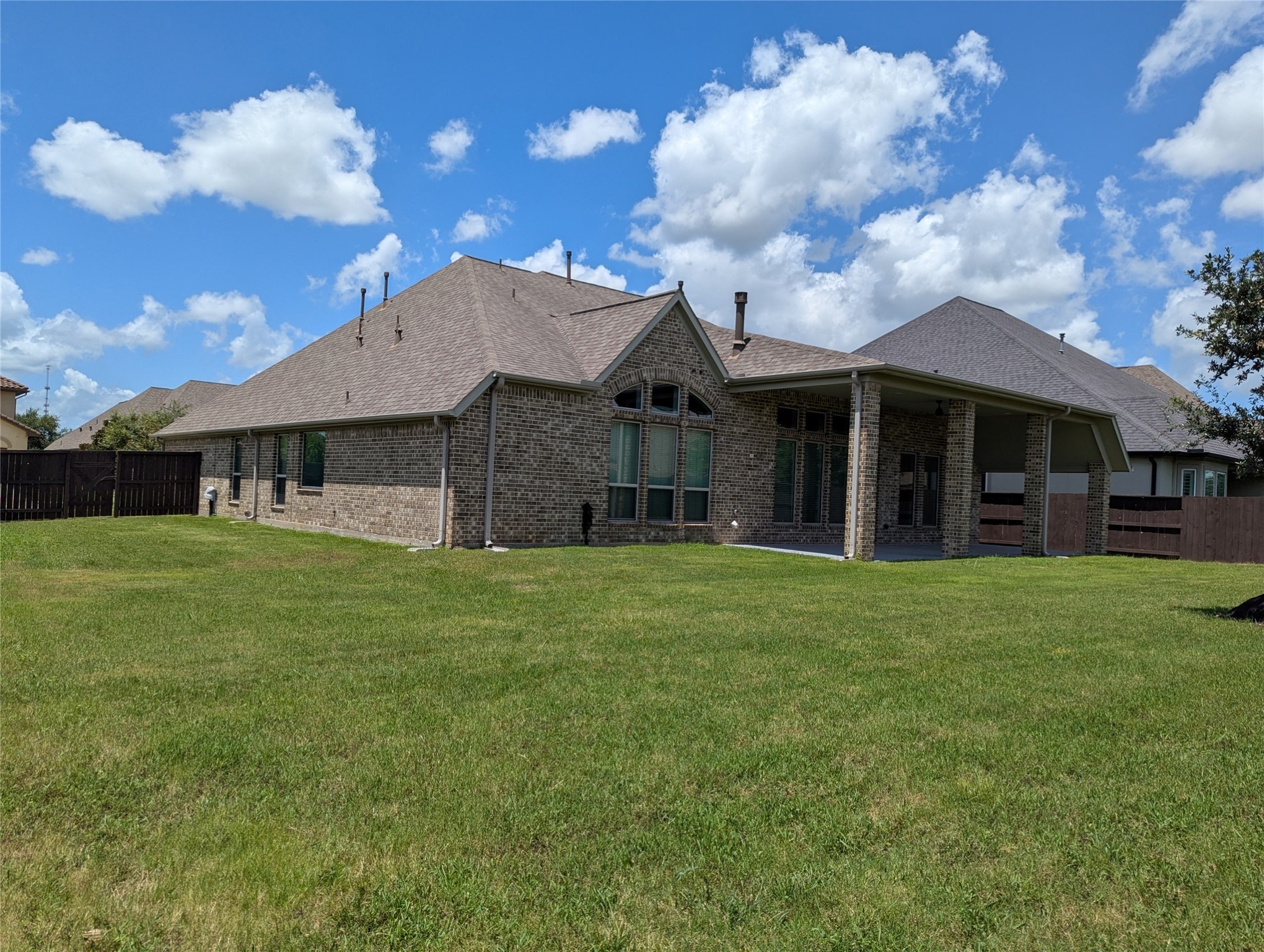 10323 Granite Court Rosharon, TX 77583 - Photo 34 of 44 a front view of a house with a garden