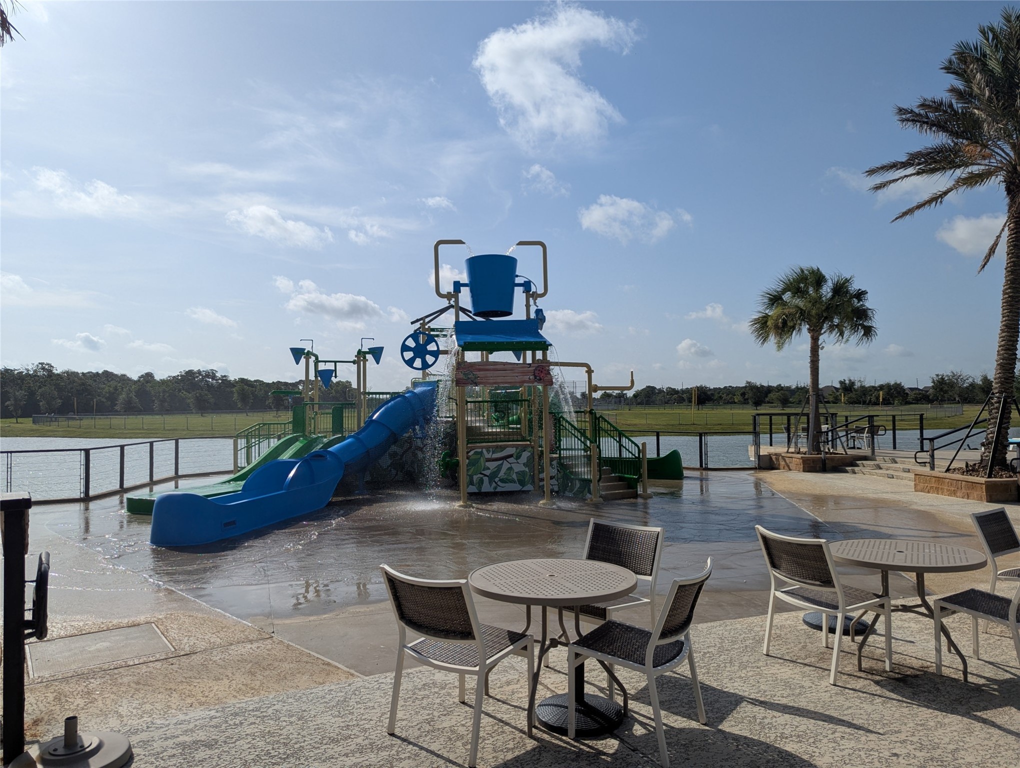 10323 Granite Court Rosharon, TX 77583 - Photo 44 of 44 a roof deck with table and chairs