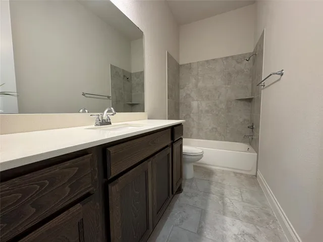 a view of wooden floor and windows in a room