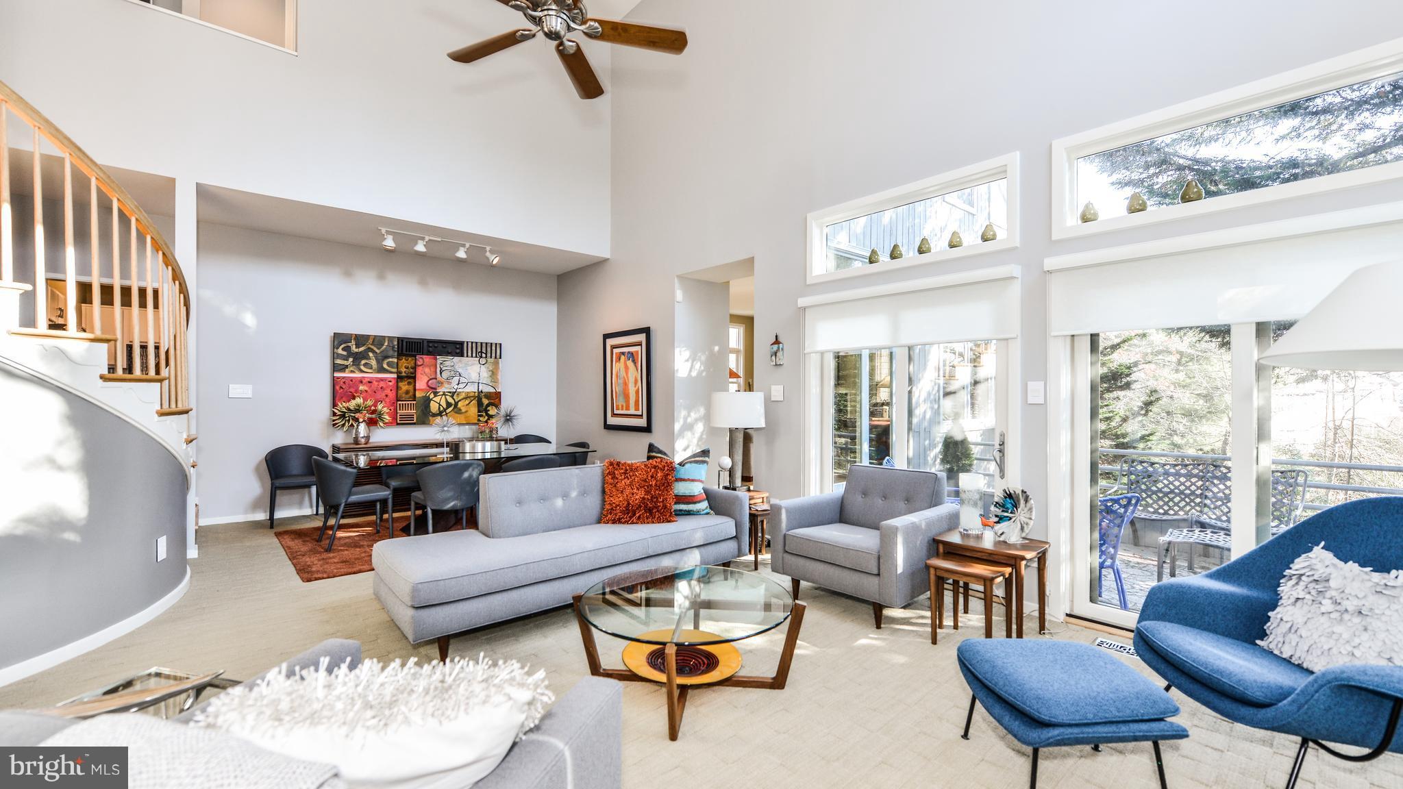 2041 Beacon Place Reston, VA 20191 - Photo 2 of 30 a living room with furniture and a large window