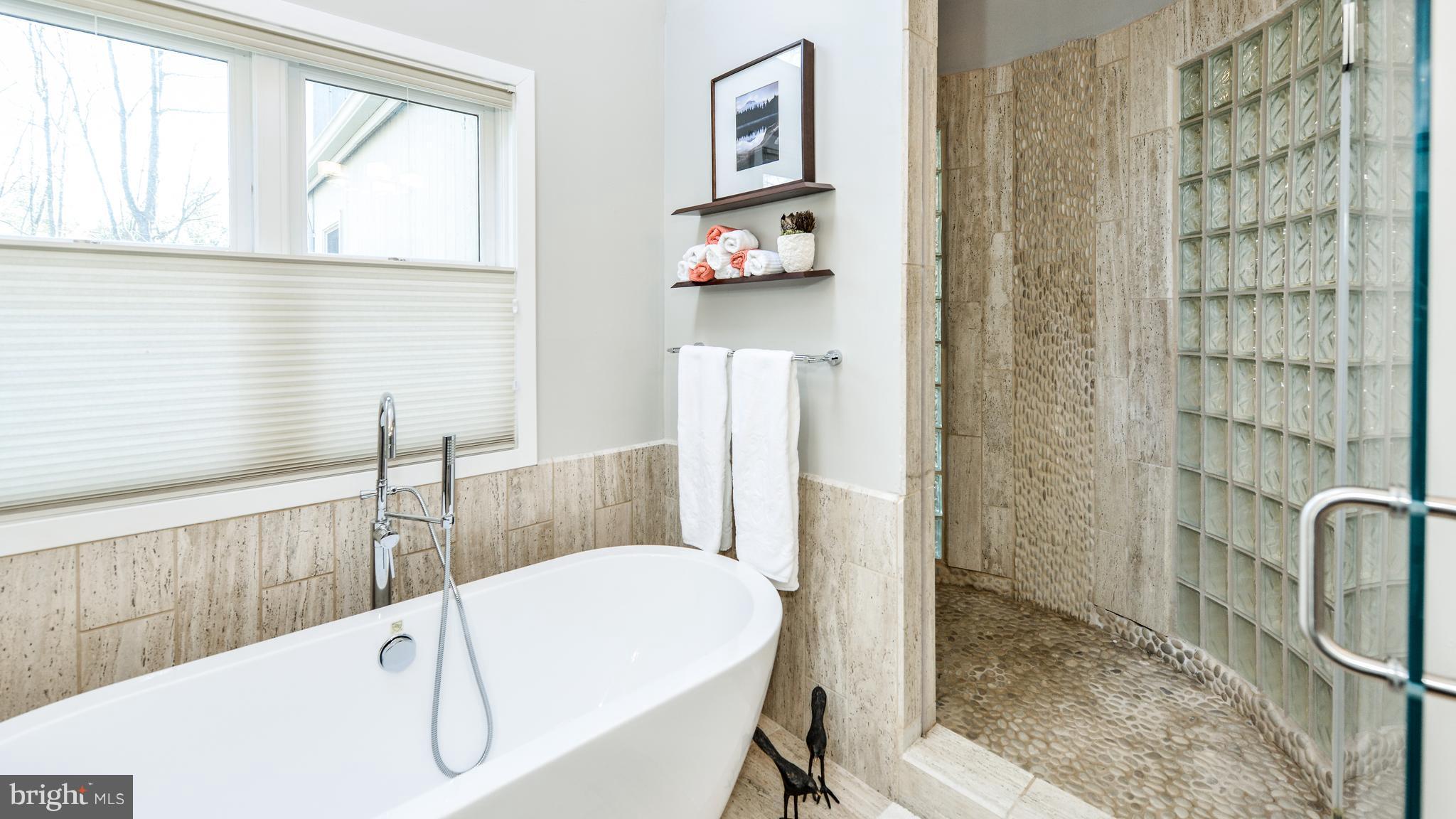 2041 Beacon Place Reston, VA 20191 - Photo 17 of 30 a bathroom with a sink a toilet and shower