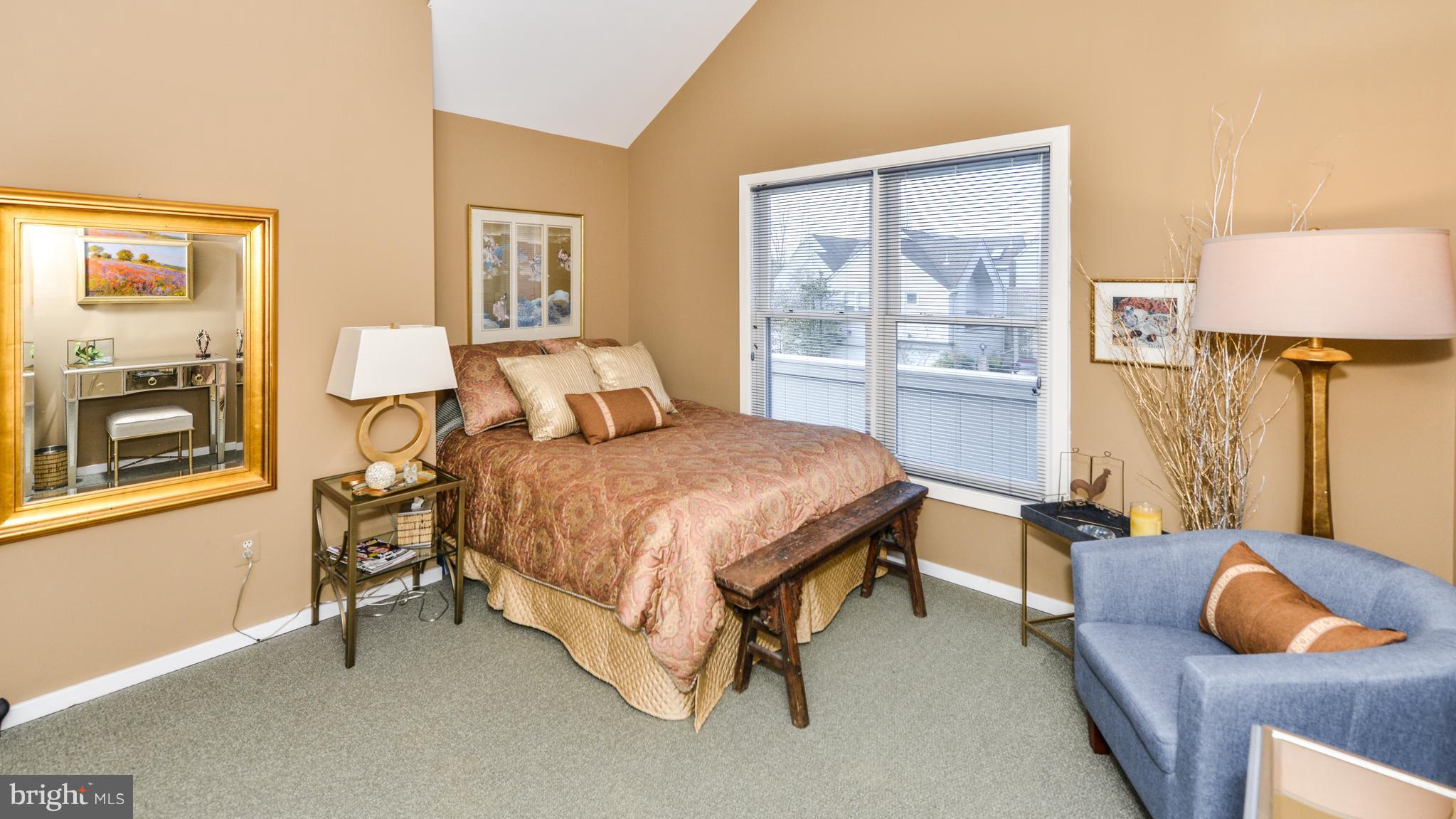 2041 Beacon Place Reston, VA 20191 - Photo 18 of 30 a bedroom with a bed and a window