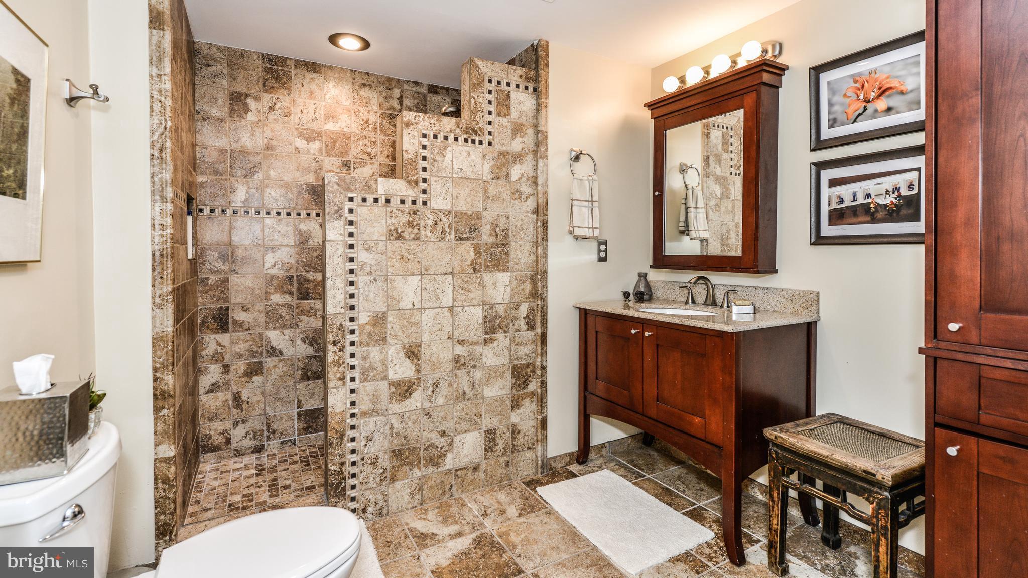 2041 Beacon Place Reston, VA 20191 - Photo 24 of 30 a bathroom with a sink toilet and shower