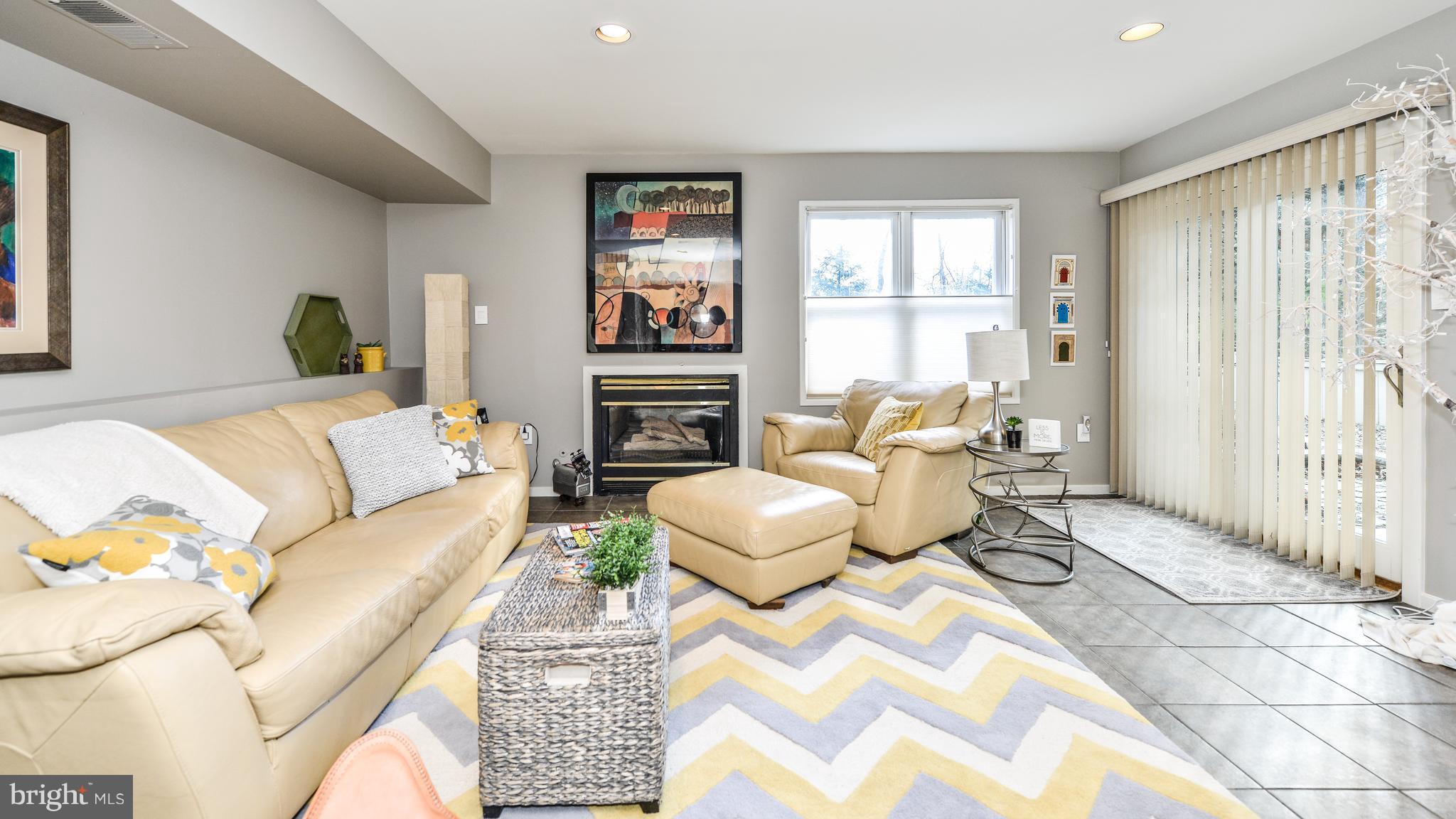 2041 Beacon Place Reston, VA 20191 - Photo 26 of 30 a living room with furniture and a large window