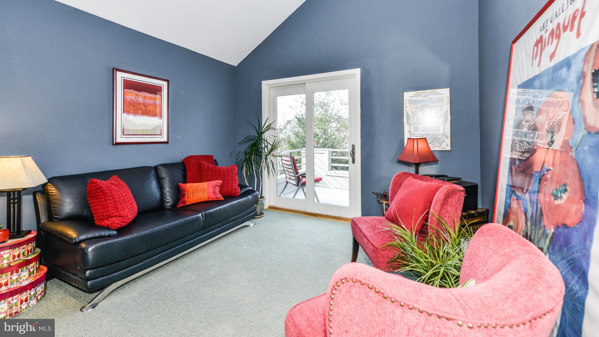 2041 Beacon Place Reston, VA 20191 - Photo 27 of 30 a living room with furniture fireplace and a large window