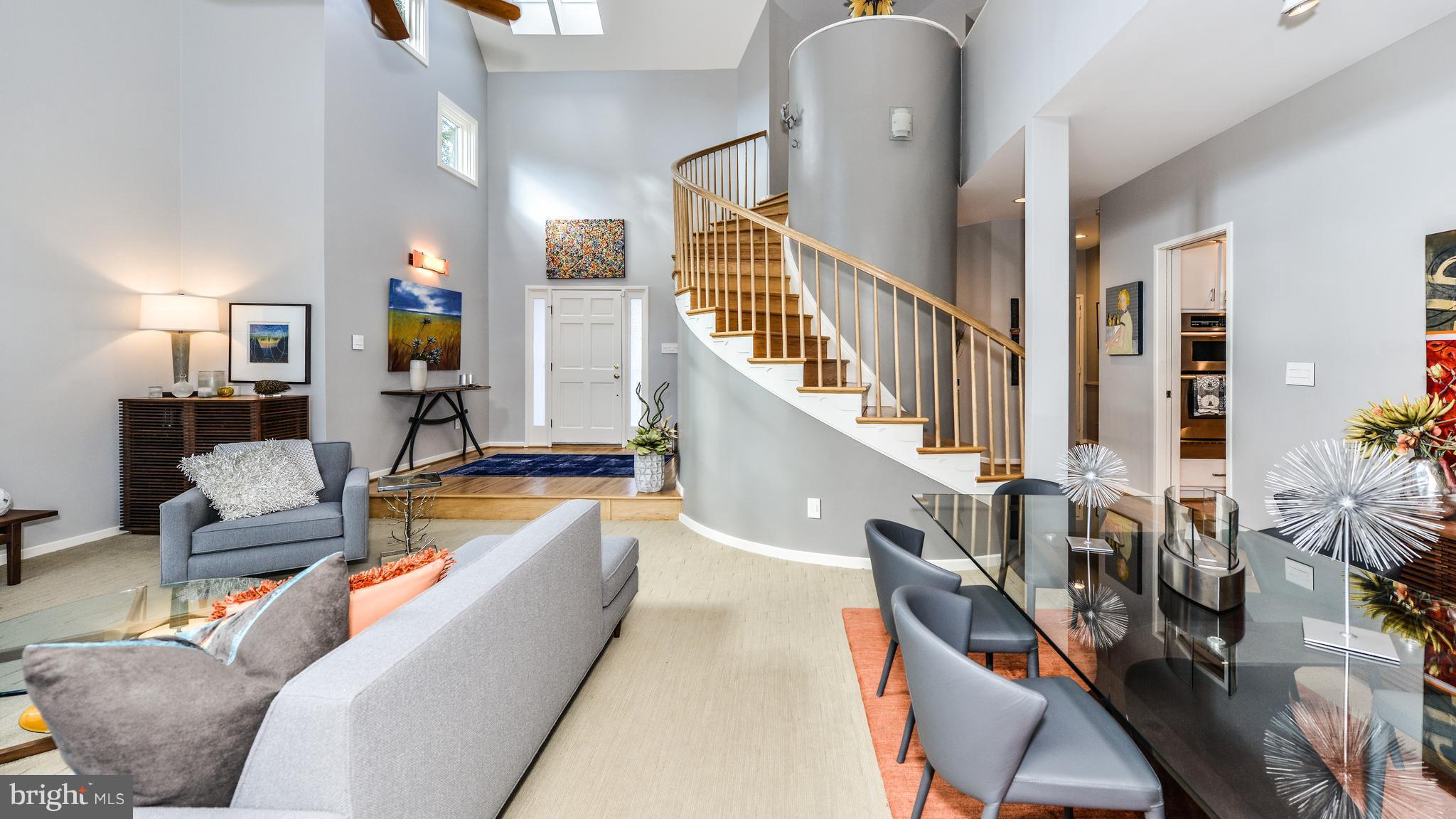 2041 Beacon Place Reston, VA 20191 - Photo 4 of 30 a living room with furniture and a table