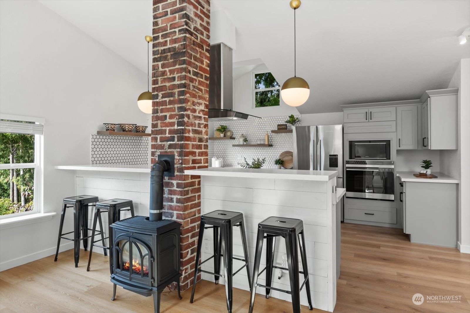 15908 68th Avenue West Edmonds, WA 98026 - Photo 13 of 40 a kitchen with furniture and window