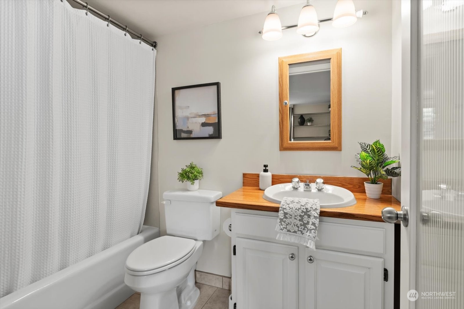 15908 68th Avenue West Edmonds, WA 98026 - Photo 25 of 40 a bathroom with a sink toilet and shower