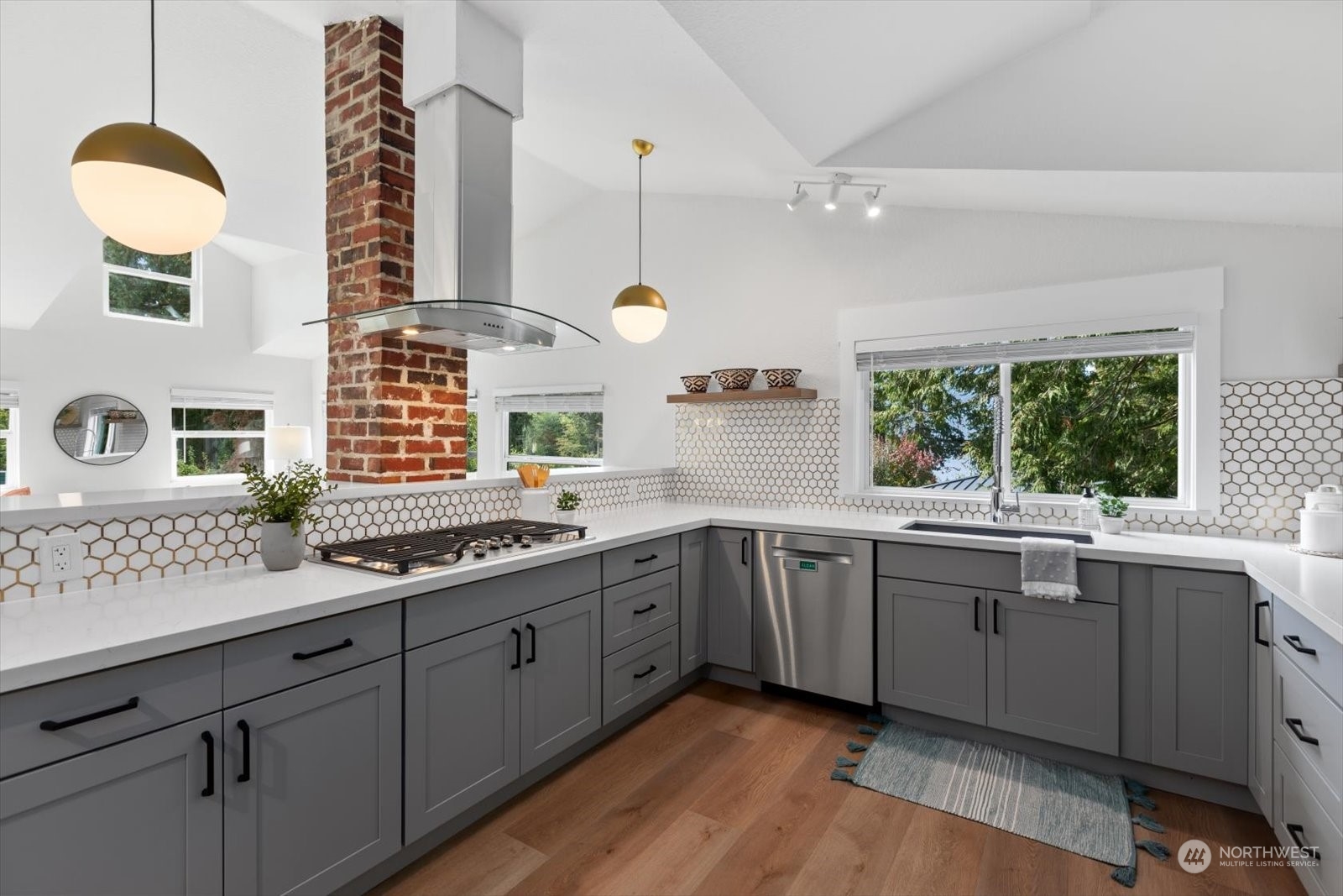 15908 68th Avenue West Edmonds, WA 98026 - Photo 8 of 40 a kitchen with a sink window and cabinets
