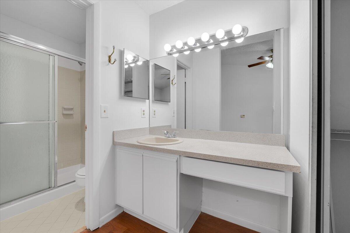 4718 Northwest 82nd Avenue, Unit 1706 Lauderhill, FL 33351 - Photo 5 of 12 a bathroom with a sink and a mirror