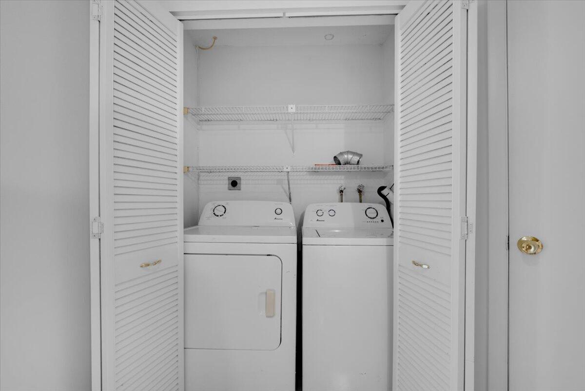 4718 Northwest 82nd Avenue, Unit 1706 Lauderhill, FL 33351 - Photo 8 of 12 a utility room with dryer and washer