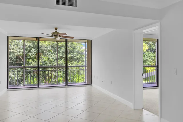 a view of a glass door with a outdoor space
