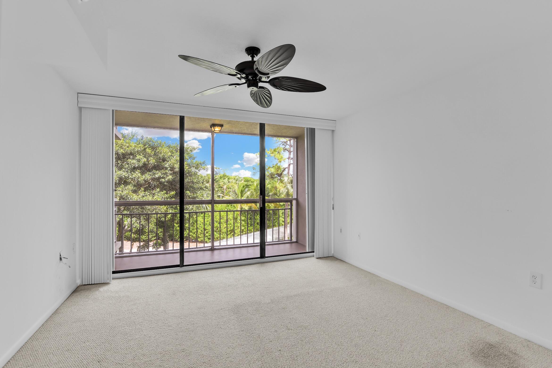 6133 Balboa Circle, Unit 304 Boca Raton, FL 33433 - Photo 30 of 48 a view of an empty room with a window
