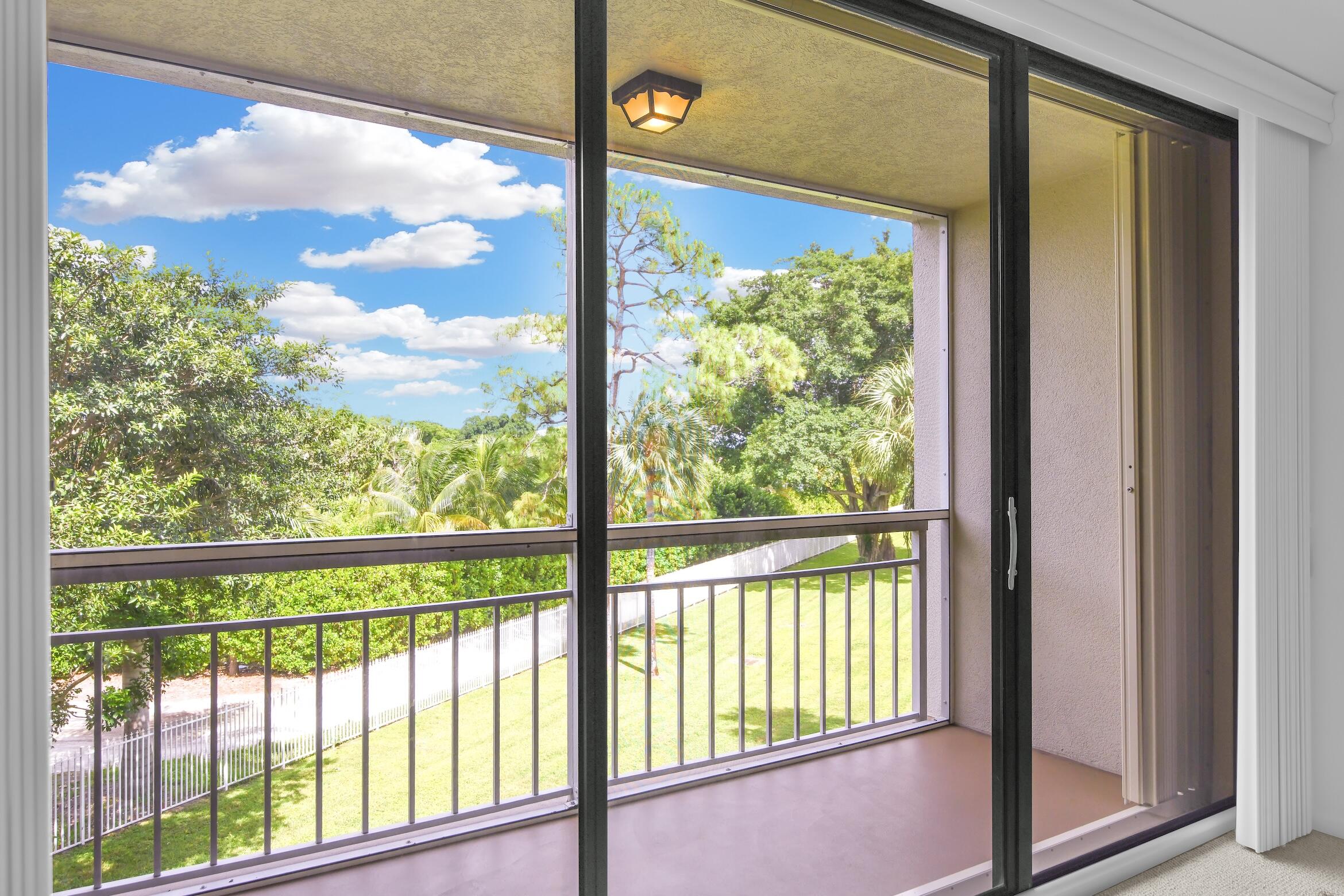 6133 Balboa Circle, Unit 304 Boca Raton, FL 33433 - Photo 32 of 48 a view of a room with a large window