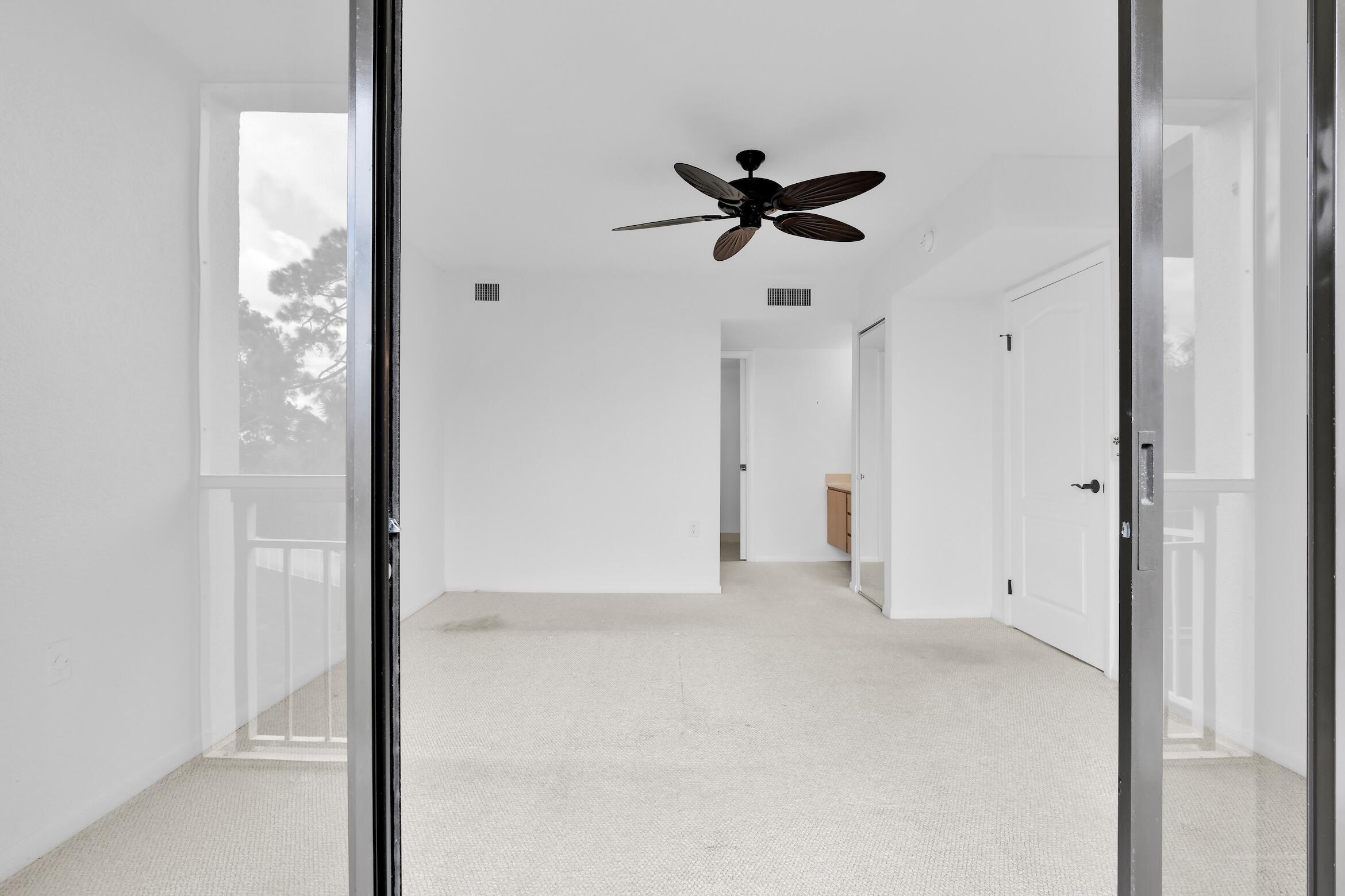 6133 Balboa Circle, Unit 304 Boca Raton, FL 33433 - Photo 34 of 48 a view of empty room