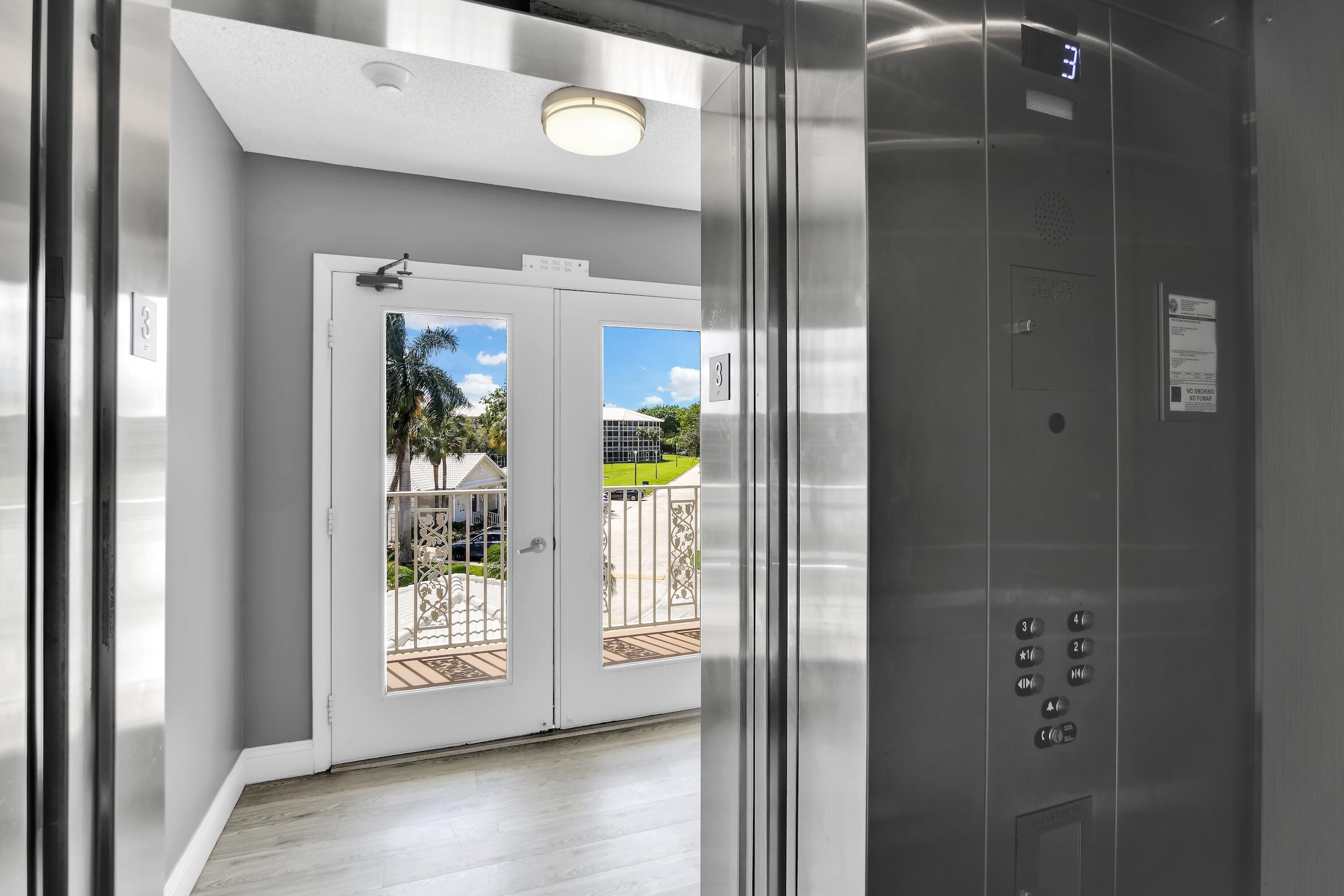6133 Balboa Circle, Unit 304 Boca Raton, FL 33433 - Photo 4 of 48 a view of a bathroom with a glass door