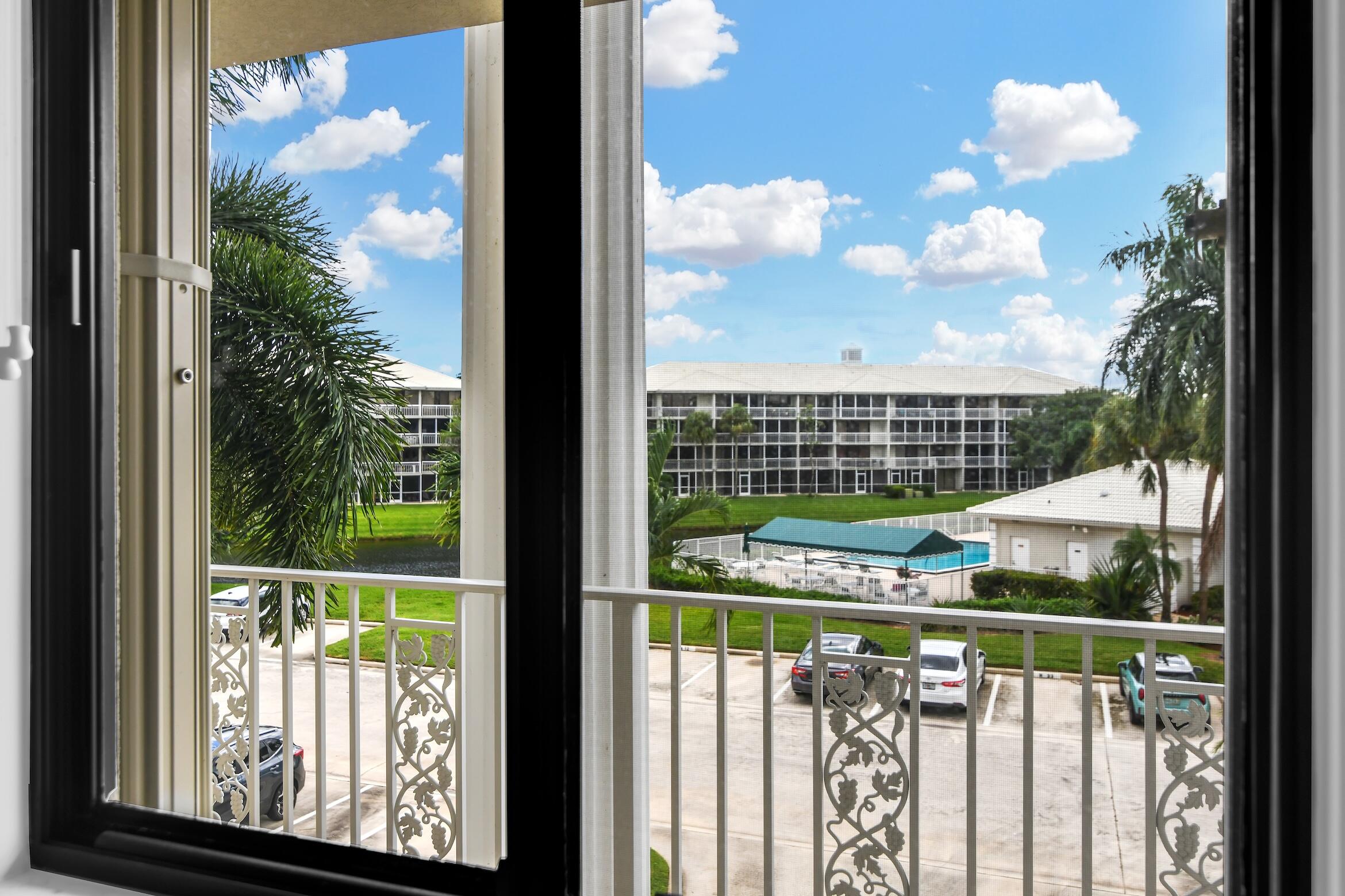 6133 Balboa Circle, Unit 304 Boca Raton, FL 33433 - Photo 42 of 48 a view of a balcony