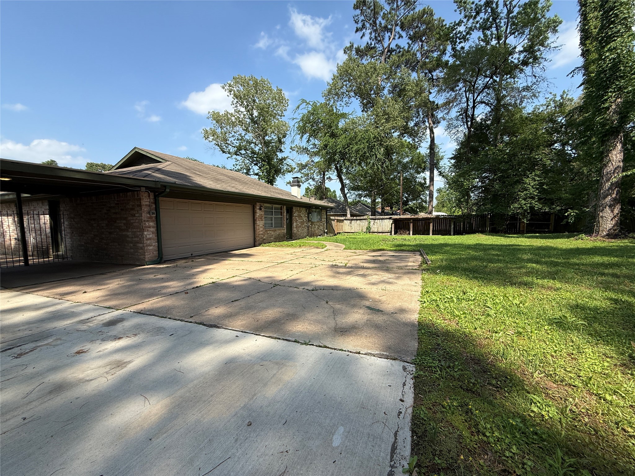 422 Gamewood Drive Spring, TX 77386 - Photo 23 of 25 a view of a house with a yard
