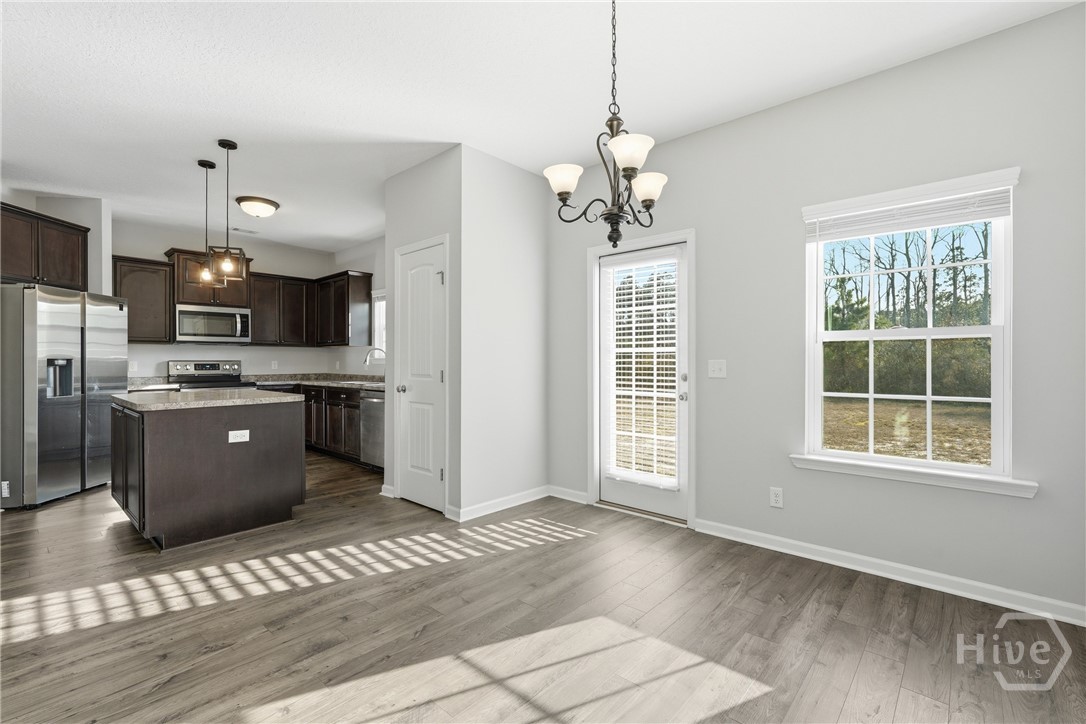 1297 Talmadge Road Allenhurst, GA 31301 - Photo 14 of 32 Dining area into the kitchen