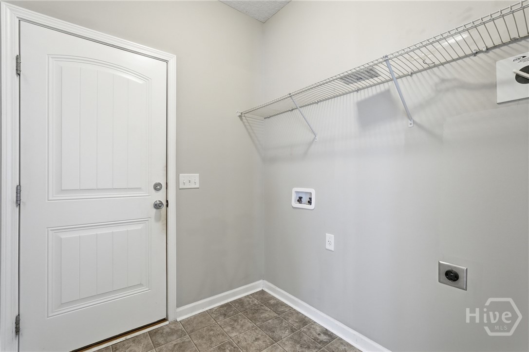 1297 Talmadge Road Allenhurst, GA 31301 - Photo 27 of 32 Laundry room to garage