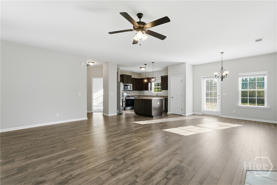 1297 Talmadge Road Allenhurst, GA 31301 - Photo 6 of 32 Living room, dining room and kitchen
