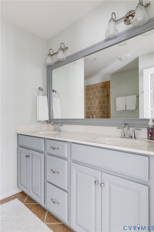 3900 Redbud Road Glen Allen, VA 23060 - Photo 24 of 37 a bathroom with a sink and a mirror