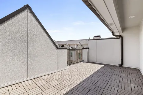 a view of a backyard of the house