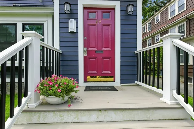 a view of a building with a potted plant