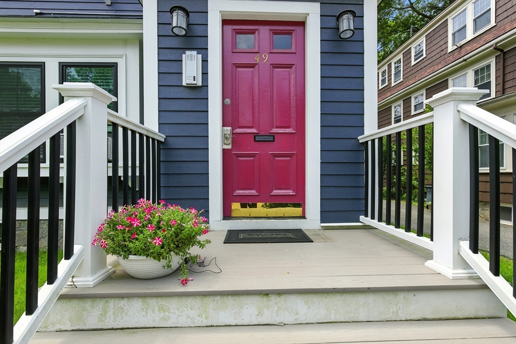 a view of a building with a potted plant