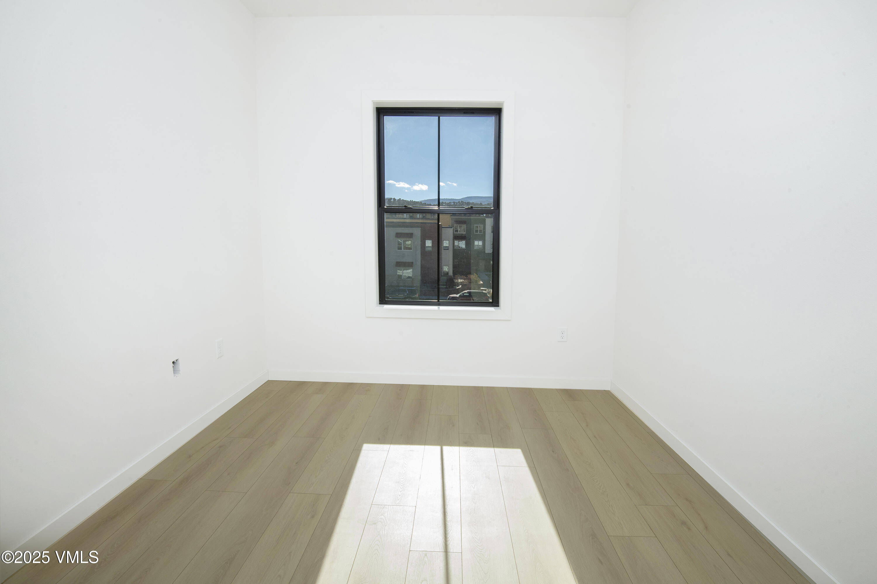 1200 Capitol Street, Unit 101 Eagle, CO 81631 - Photo 12 of 33 an empty room with a window
