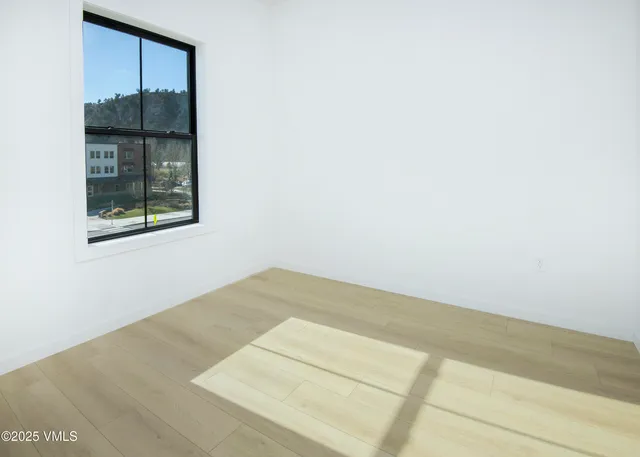 an empty room with window