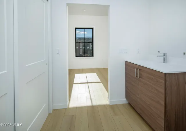a view of an empty room and window