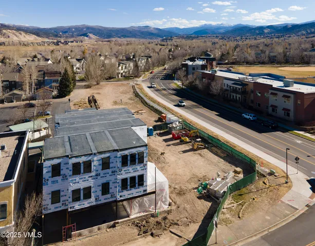 a view of a balcony with an outdoor seating