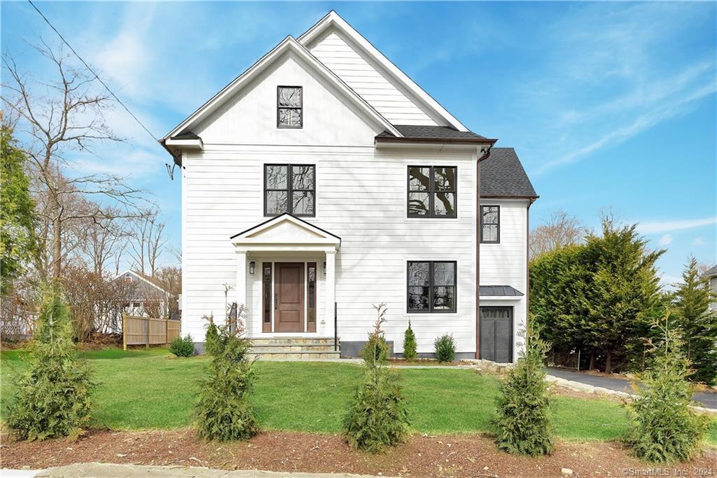 74 West Avenue Darien, CT 06820 - Photo 1 of 1 a view of a yard in front of house