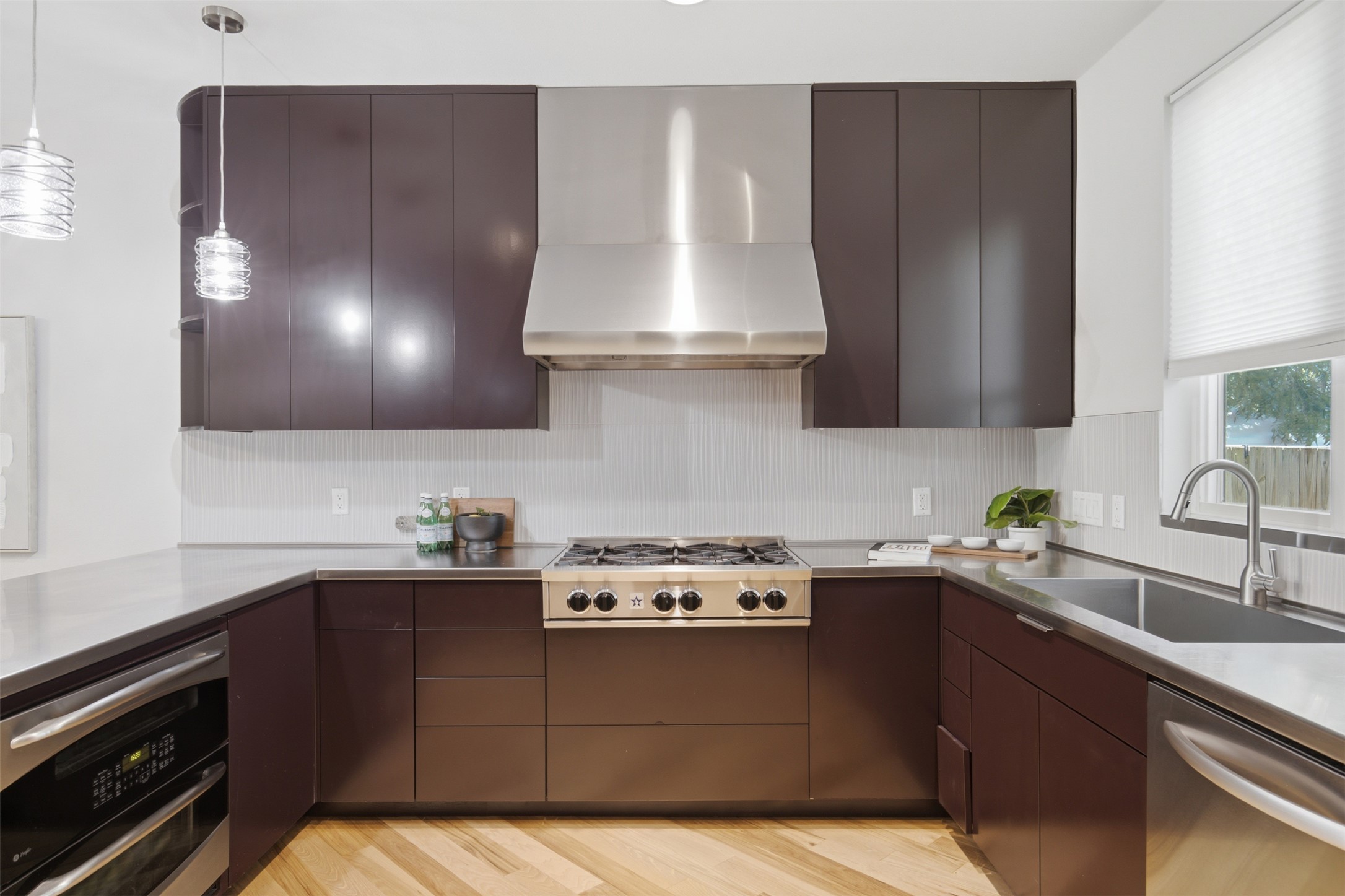206 East 43rd Street Austin, TX 78751 - Photo 12 of 29 Rich deep colored cabinets that are impeccably done and offer plenty of space for the chef.