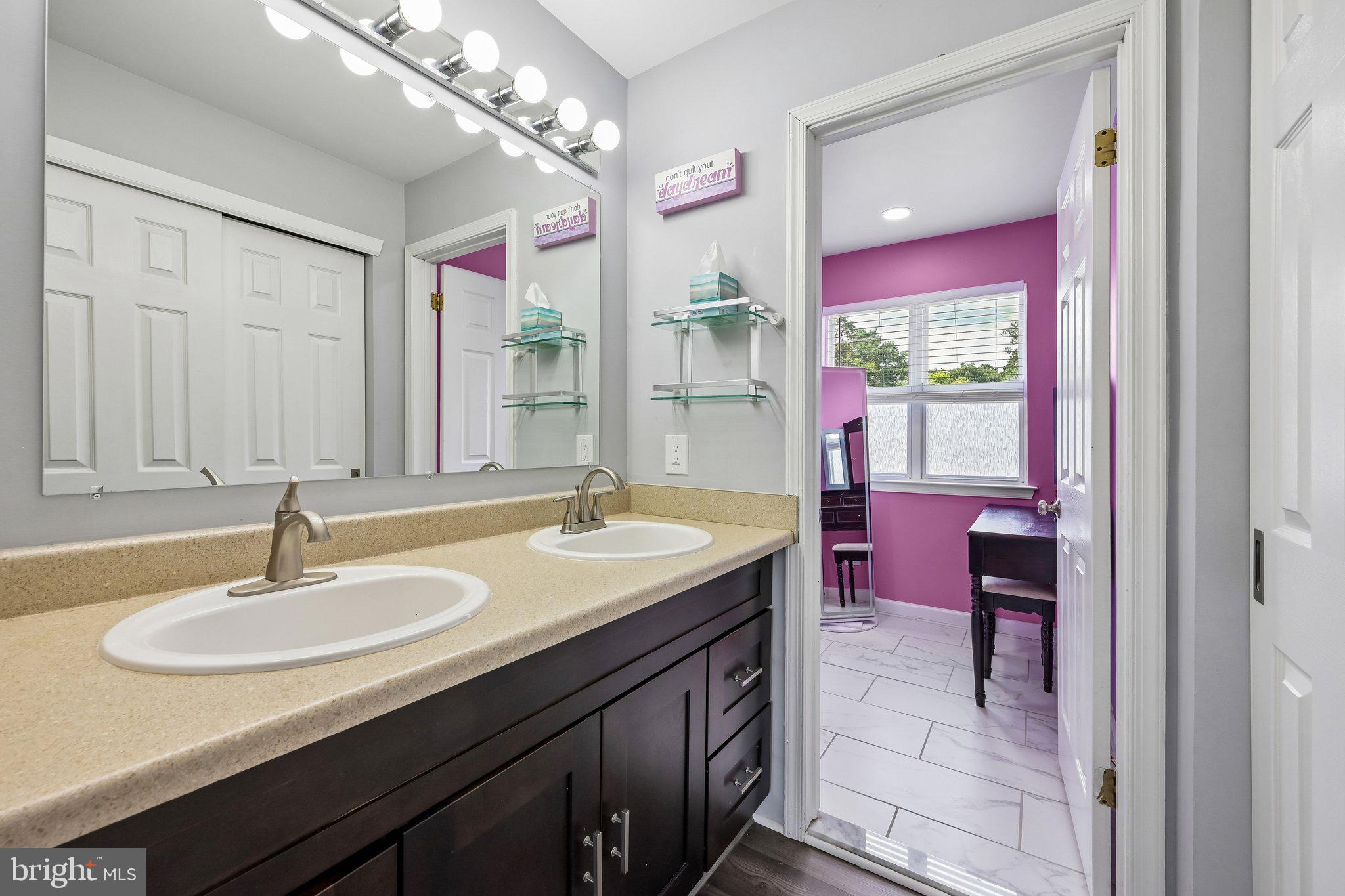14 Chestertown Road Sicklerville, NJ 08081 - Photo 23 of 29 Chic dual-sink bathroom retreat.