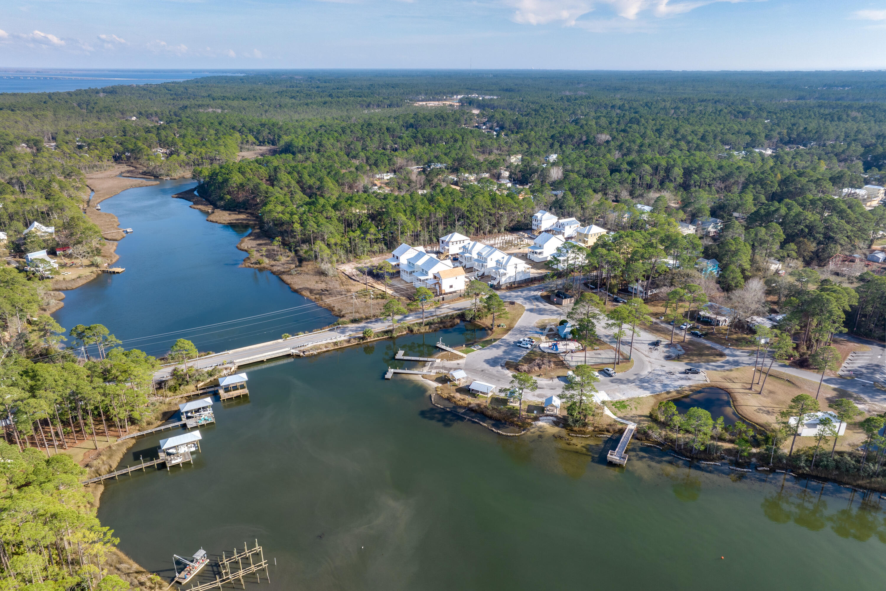 40 Mckenna Way Santa Rosa Beach, FL 32459 - Photo 10 of 61 an aerial view of residential houses with outdoor space and lake view
