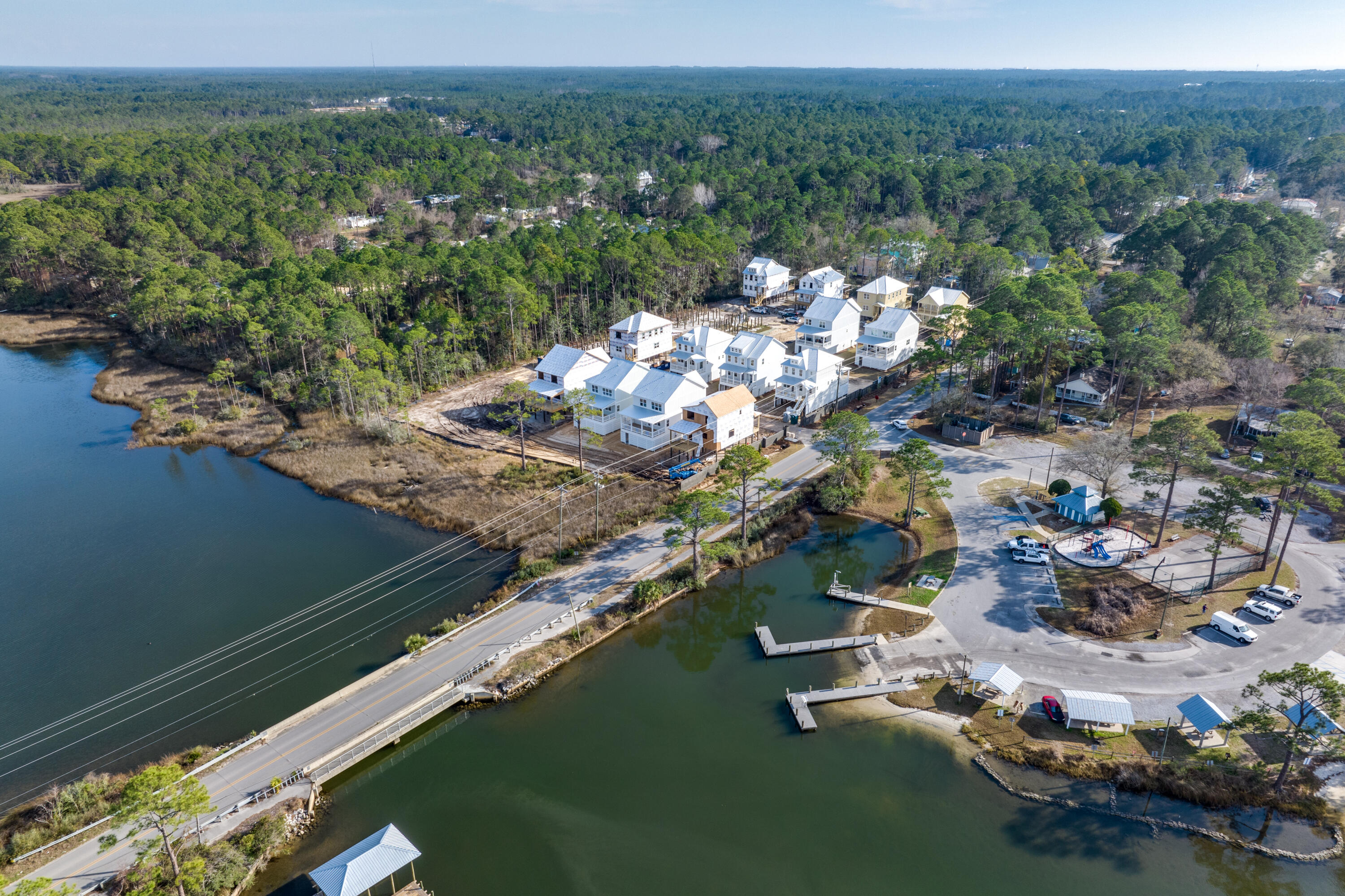 40 Mckenna Way Santa Rosa Beach, FL 32459 - Photo 12 of 61 a view of a lake with a city