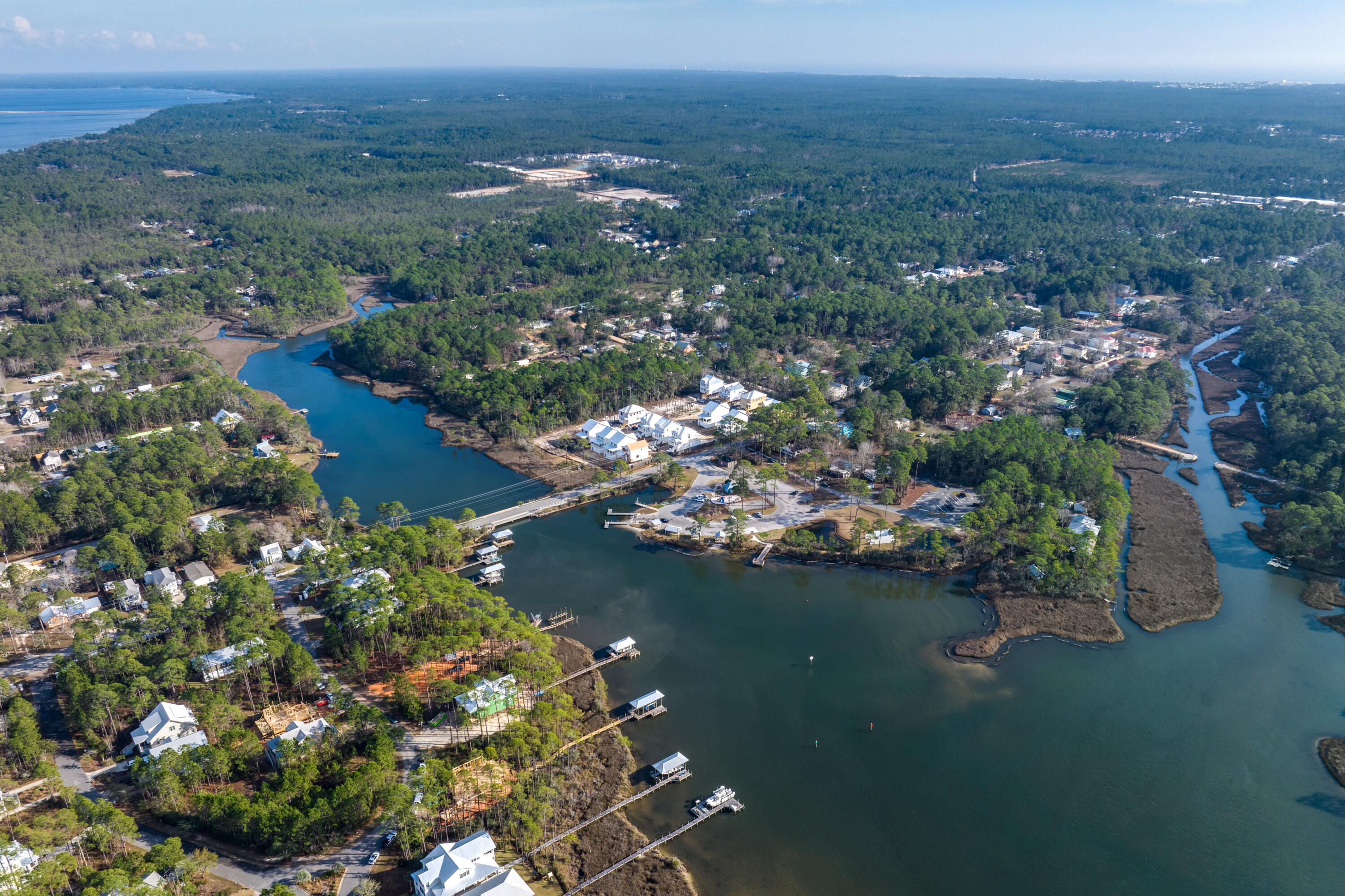 40 Mckenna Way Santa Rosa Beach, FL 32459 - Photo 13 of 61 a view of a lake with a mountain in the background