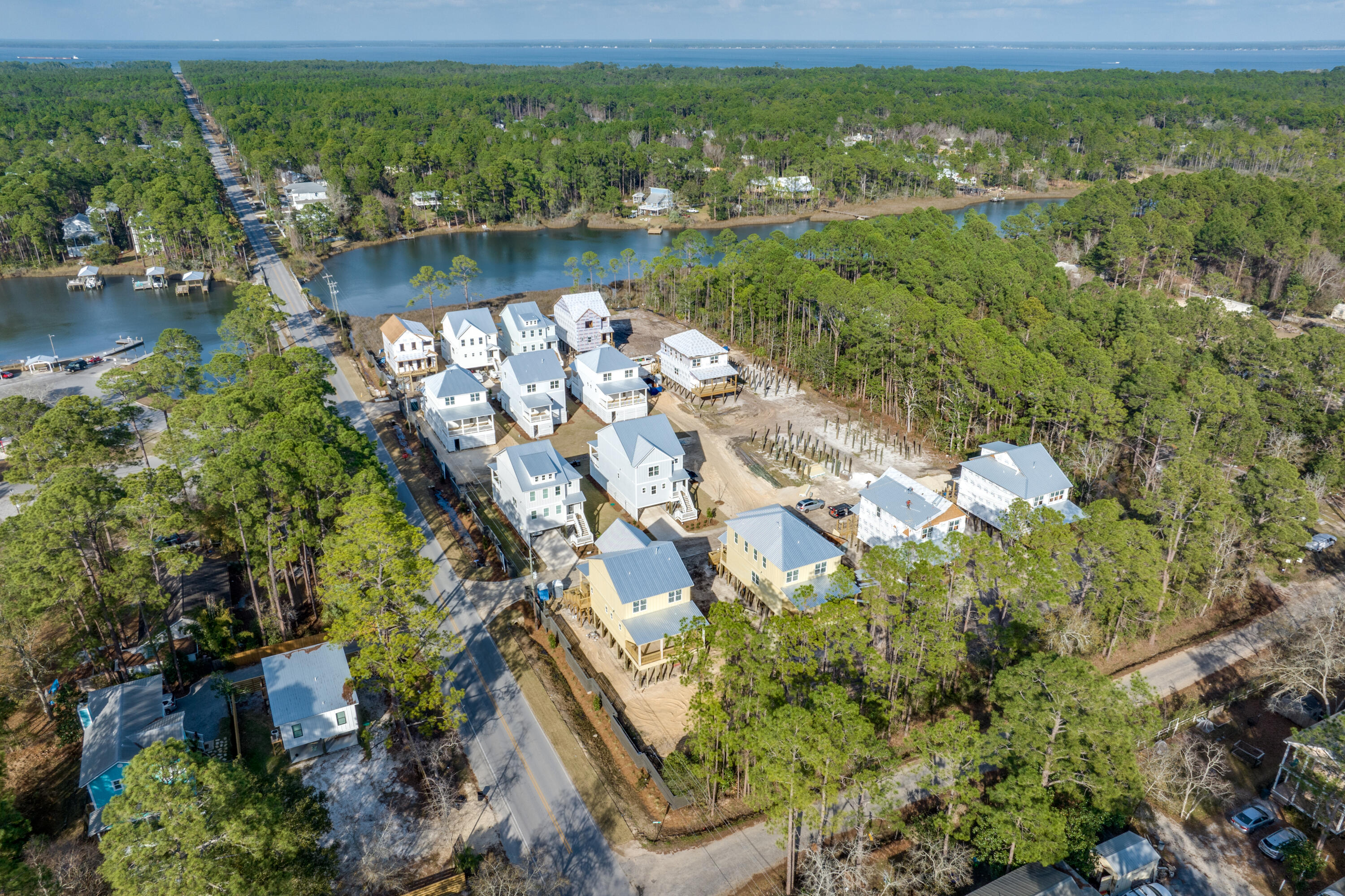 40 Mckenna Way Santa Rosa Beach, FL 32459 - Photo 15 of 61 a view of a lake with a houses