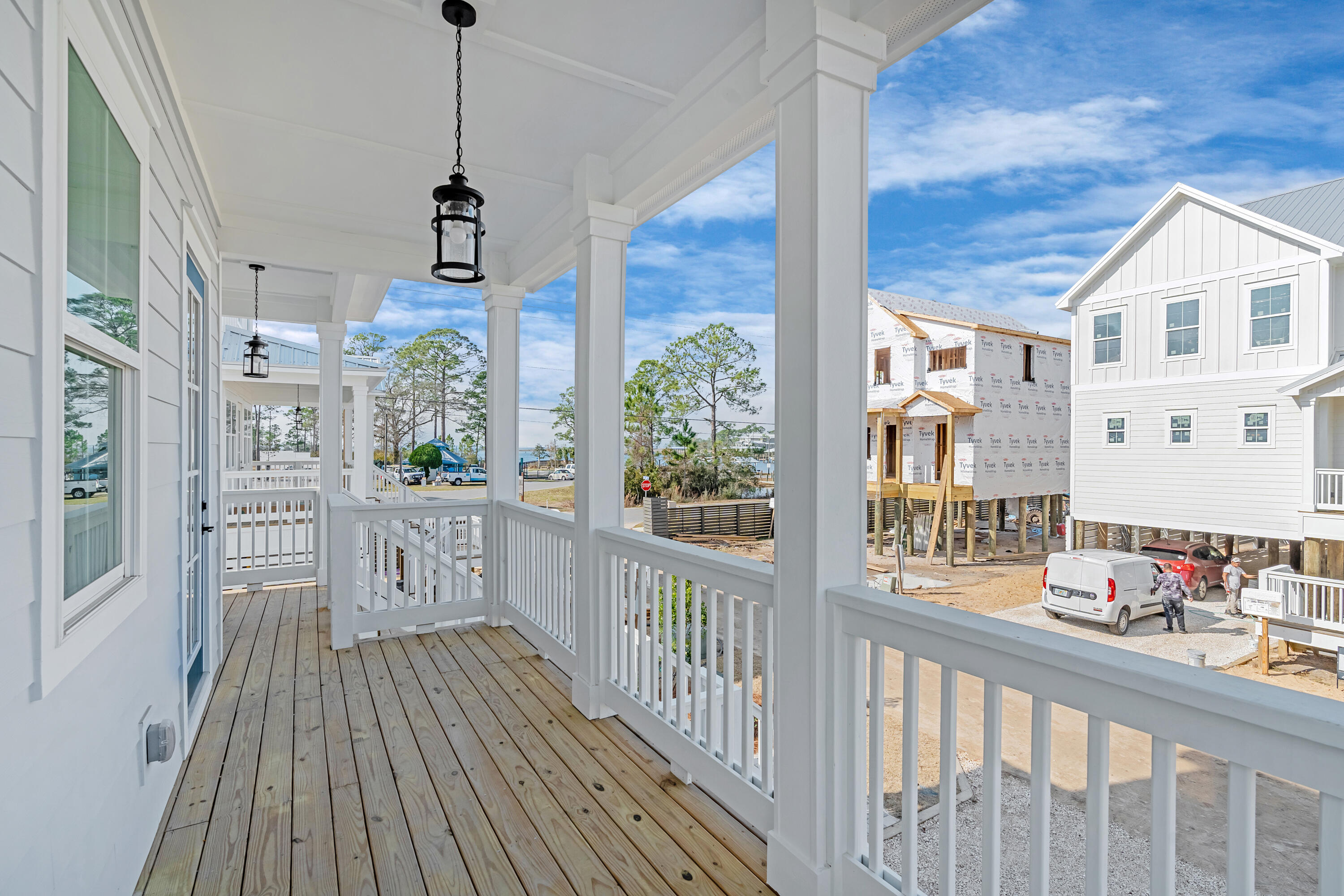 40 Mckenna Way Santa Rosa Beach, FL 32459 - Photo 17 of 61 a view of a porch with wooden floor and outdoor space