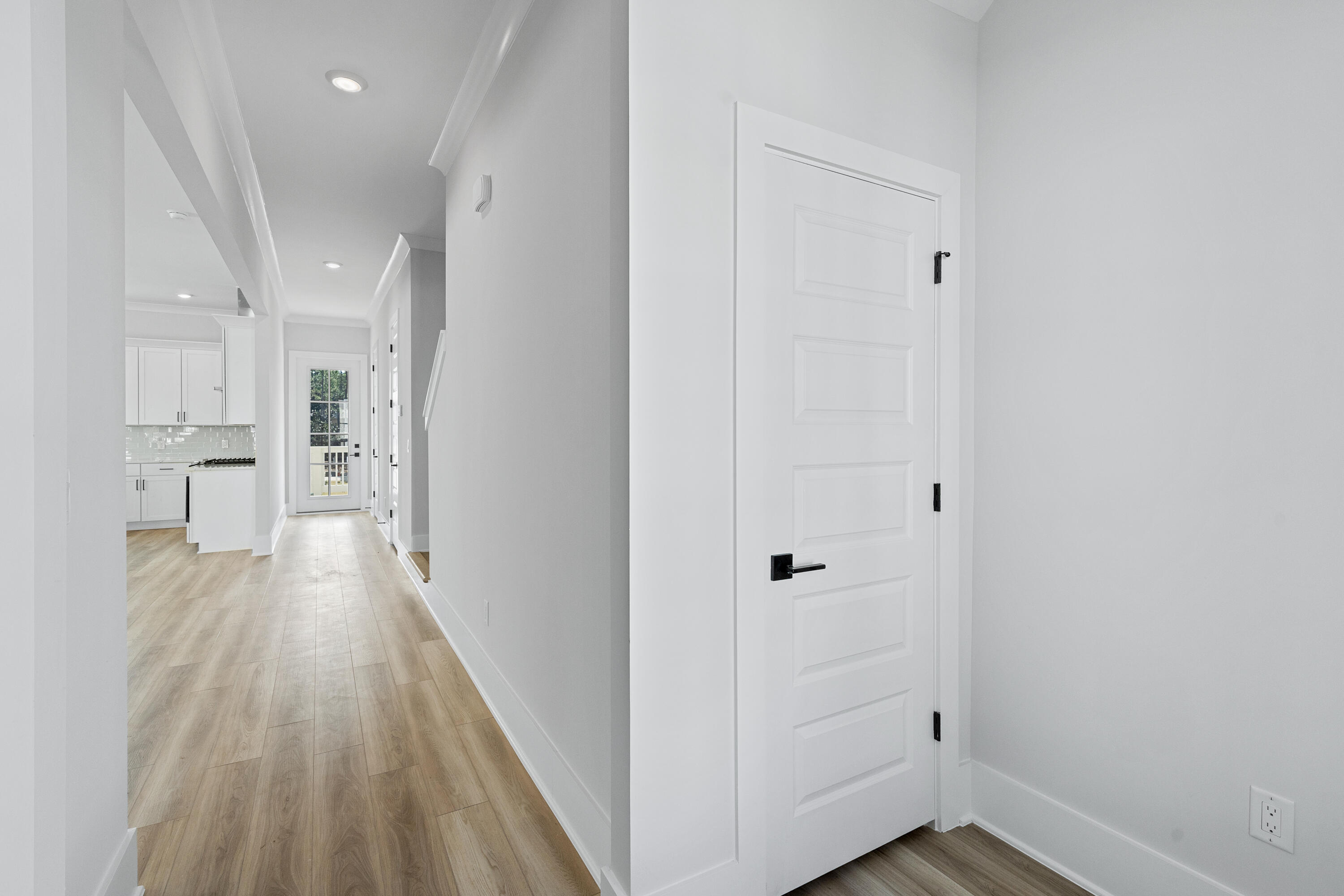 40 Mckenna Way Santa Rosa Beach, FL 32459 - Photo 19 of 61 a view of a hallway with wooden floor and a space
