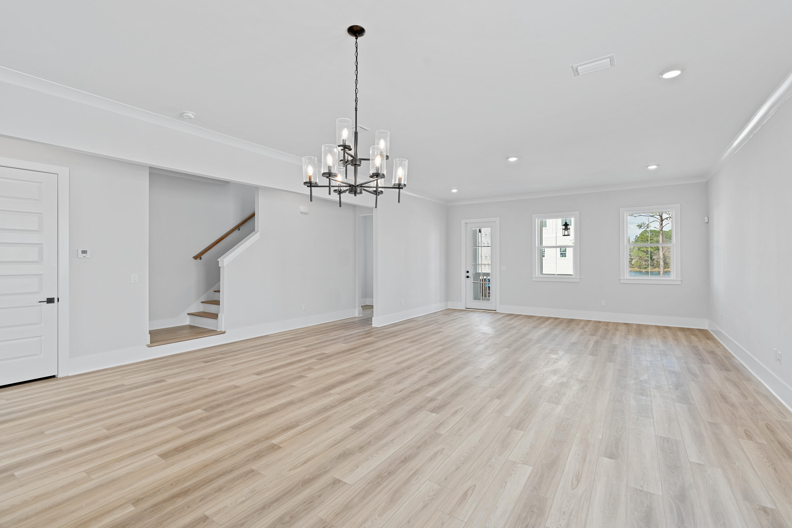 40 Mckenna Way Santa Rosa Beach, FL 32459 - Photo 26 of 61 a view of empty room with wooden floor and window