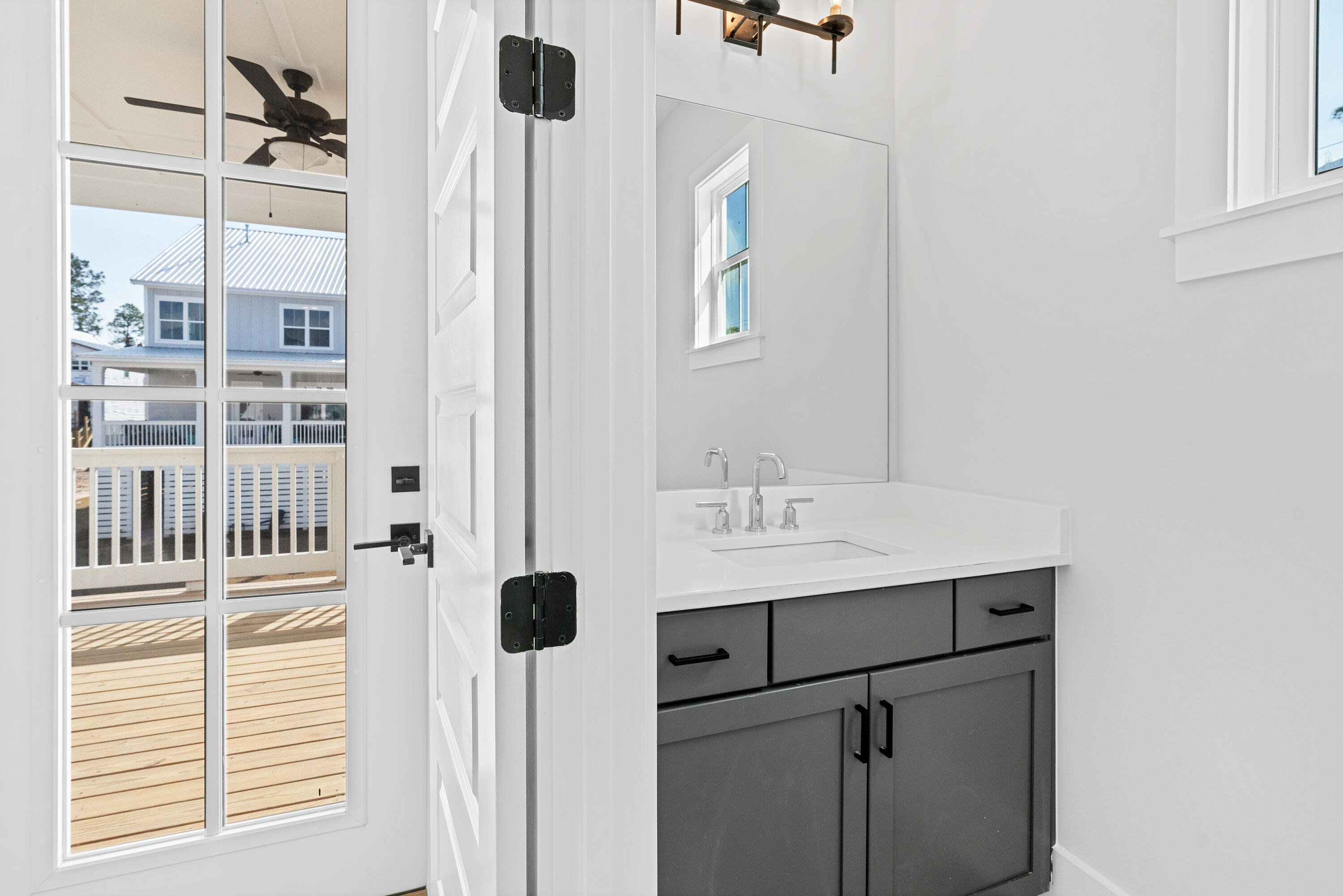 40 Mckenna Way Santa Rosa Beach, FL 32459 - Photo 35 of 61 a kitchen with a sink cabinets and appliances