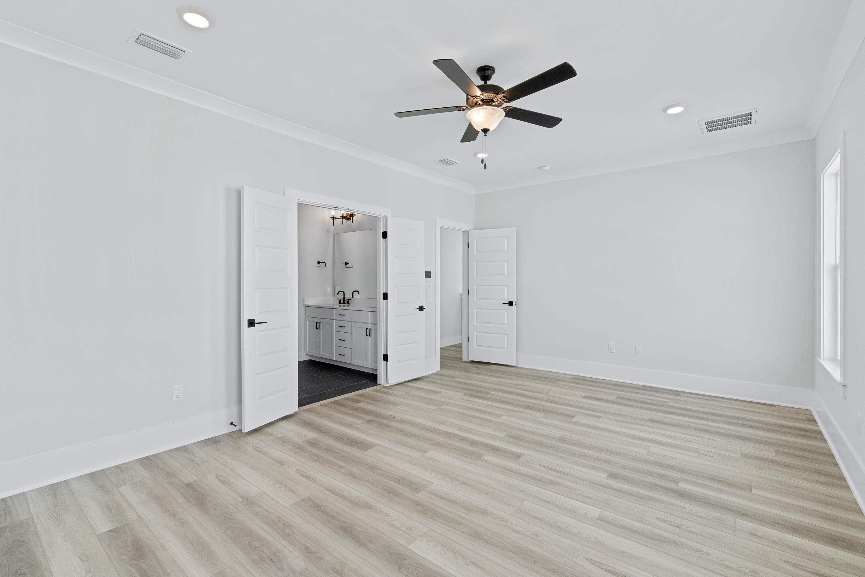40 Mckenna Way Santa Rosa Beach, FL 32459 - Photo 39 of 61 a view of a livingroom with a ceiling fan & entryway