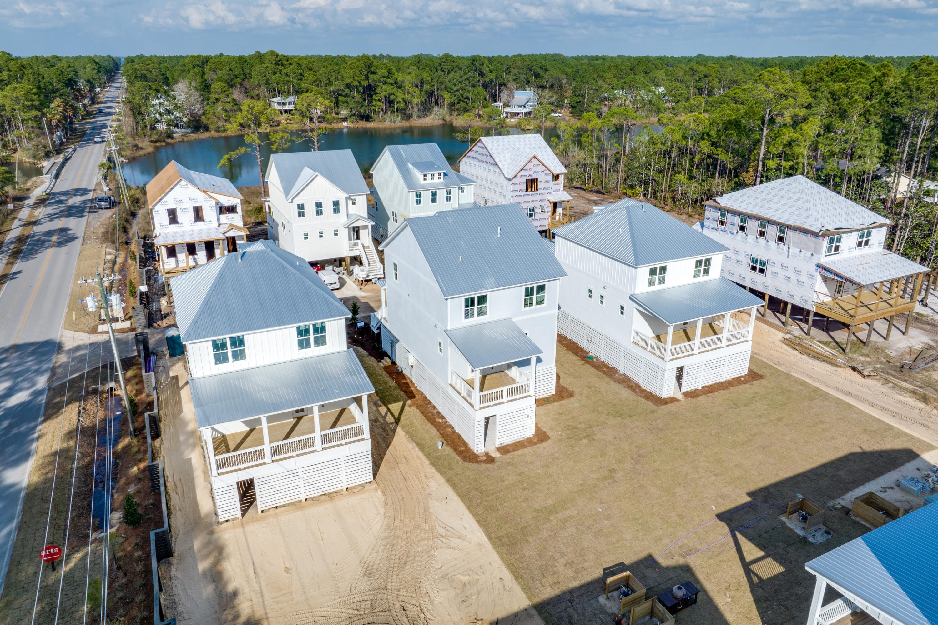 40 Mckenna Way Santa Rosa Beach, FL 32459 - Photo 3 of 61 an aerial view of residential houses with outdoor space and trees